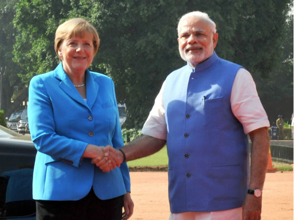 modi_merkel_visiting_bangalore_niharonline.jpg